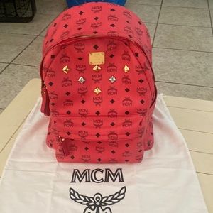 MCM backpack. Used only once or twice. With dust cover bag.Looks like never used